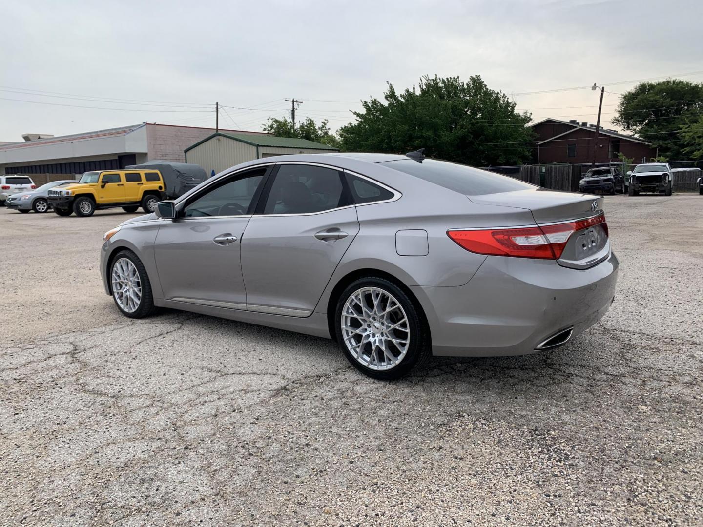 2012 Silver /Tan Hyundai Azera 3.3L (KMHFH4JG9CA) with an 3.3L V6 DOHC 24V engine, Automatic transmission, located at 1830 North Belt Line Road, Irving, TX, 75061, (469) 524-0199, 32.834373, -96.993584 - Photo#3
