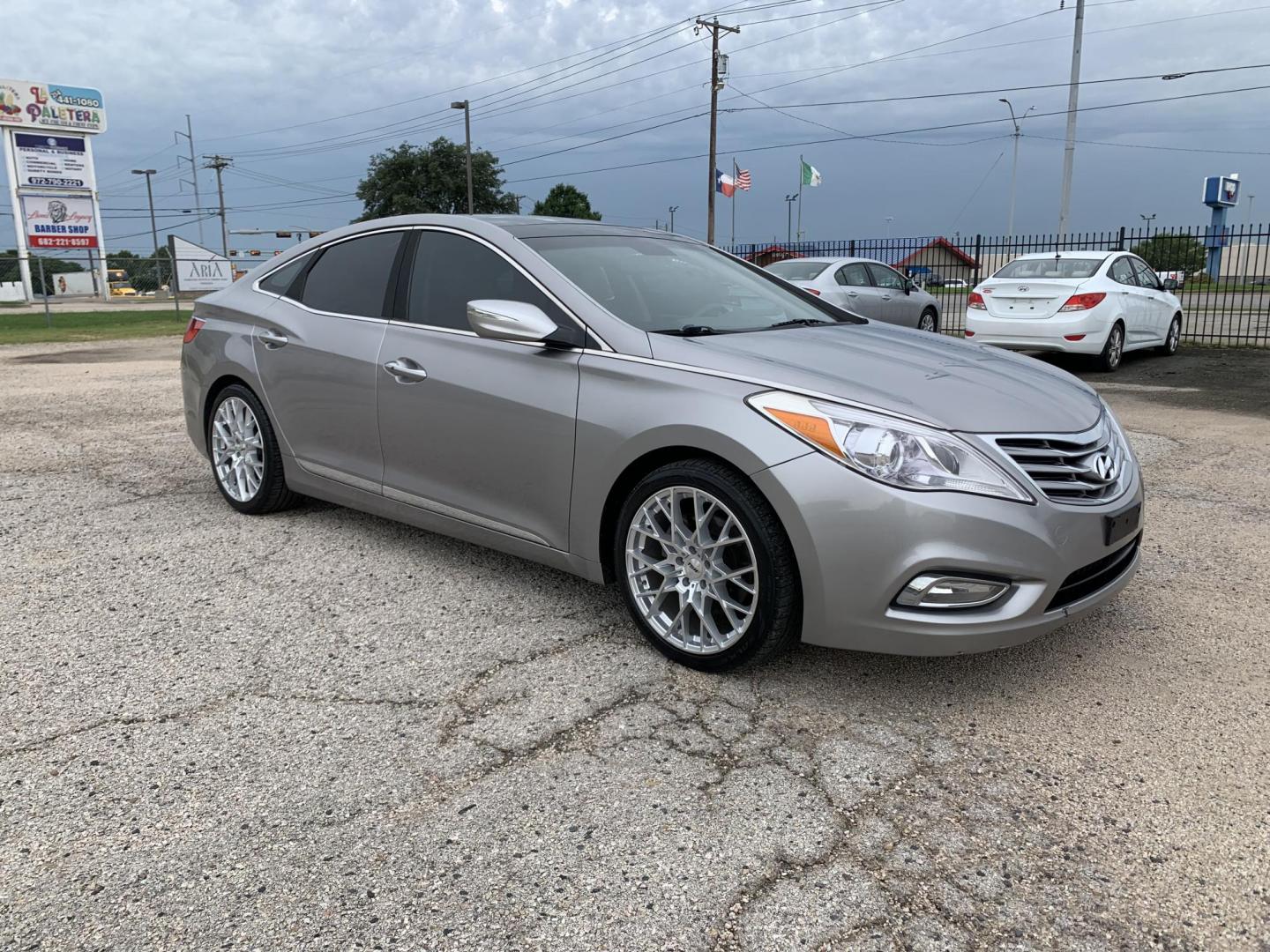 2012 Silver /Tan Hyundai Azera 3.3L (KMHFH4JG9CA) with an 3.3L V6 DOHC 24V engine, Automatic transmission, located at 1830 North Belt Line Road, Irving, TX, 75061, (469) 524-0199, 32.834373, -96.993584 - Photo#6