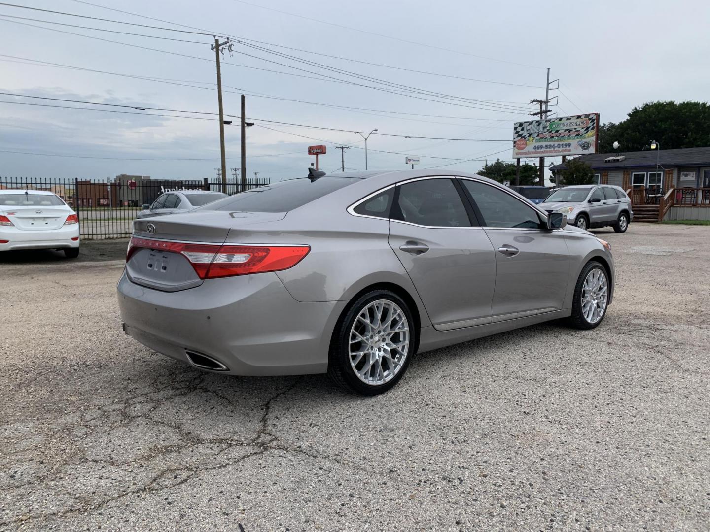 2012 Silver /Tan Hyundai Azera 3.3L (KMHFH4JG9CA) with an 3.3L V6 DOHC 24V engine, Automatic transmission, located at 1830 North Belt Line Road, Irving, TX, 75061, (469) 524-0199, 32.834373, -96.993584 - Photo#7