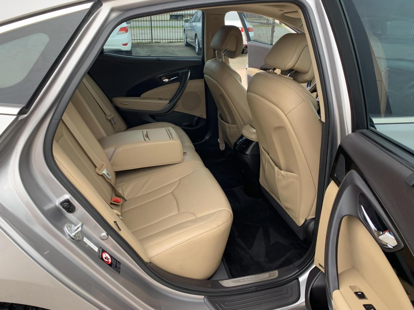 2012 Silver /Tan Hyundai Azera 3.3L (KMHFH4JG9CA) with an 3.3L V6 DOHC 24V engine, Automatic transmission, located at 1830 North Belt Line Road, Irving, TX, 75061, (469) 524-0199, 32.834373, -96.993584 - Photo#9