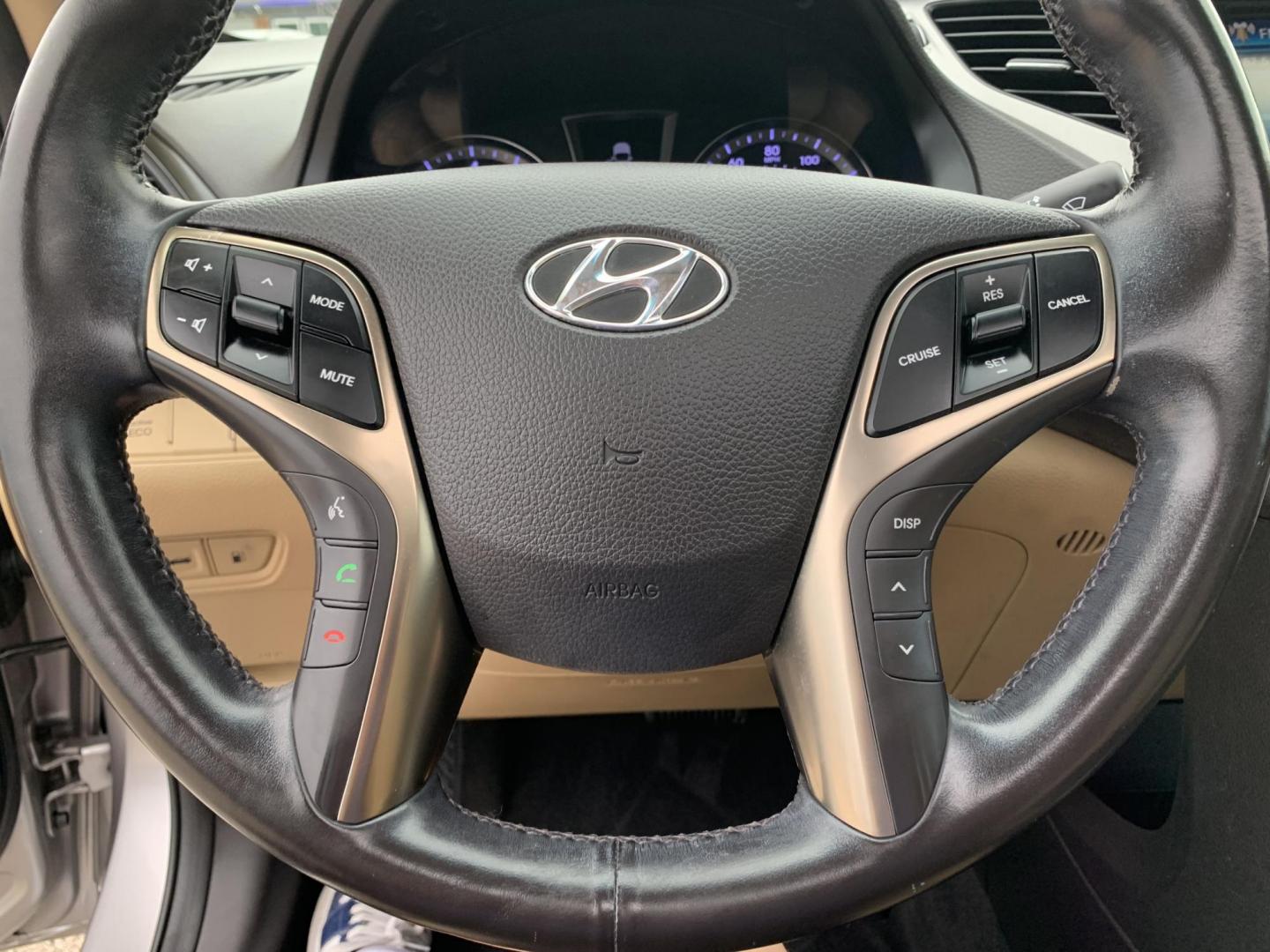 2012 Silver /Tan Hyundai Azera 3.3L (KMHFH4JG9CA) with an 3.3L V6 DOHC 24V engine, Automatic transmission, located at 1830 North Belt Line Road, Irving, TX, 75061, (469) 524-0199, 32.834373, -96.993584 - Photo#11
