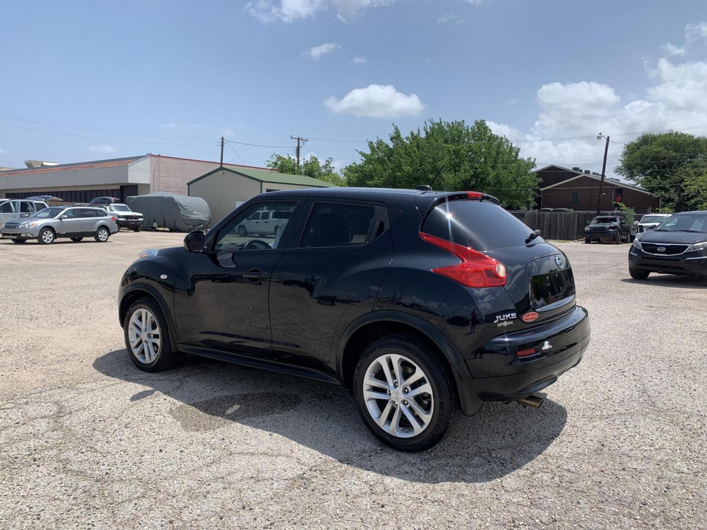 2011 Black /Black Nissan Juke S FWD (JN8AF5MR3BT) with an 1.6L L4 DOHC 16V engine, AUTOMATIC transmission, located at 1830 North Belt Line Road, Irving, TX, 75061, (469) 524-0199, 32.834373, -96.993584 - Photo#5