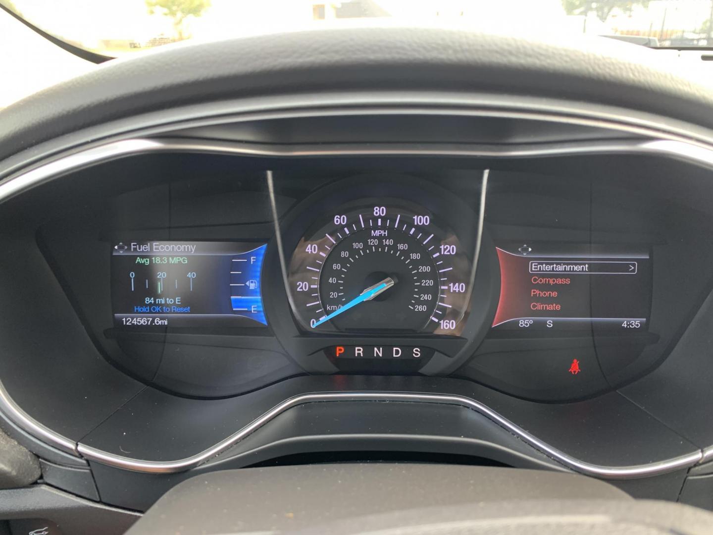 2015 White /Black Ford Fusion Titanium (3FA6P0K99FR) with an 2.0L L4 DOHC 16V engine, AUTOMATIC transmission, located at 1830 North Belt Line Road, Irving, TX, 75061, (469) 524-0199, 32.834373, -96.993584 - Photo#7