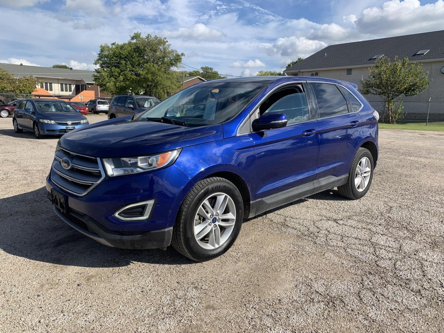 2015 Blue /Black Ford Edge SEL AWD (2FMTK4J97FB) with an 2.0L L4 DOHC 16V engine, Automatic transmission, located at 1830 North Belt Line Road, Irving, TX, 75061, (469) 524-0199, 32.834373, -96.993584 - Photo#2
