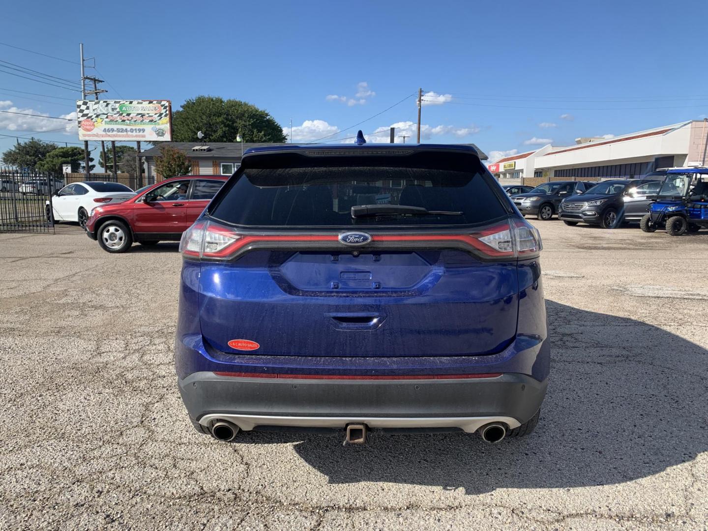 2015 Blue /Black Ford Edge SEL AWD (2FMTK4J97FB) with an 2.0L L4 DOHC 16V engine, Automatic transmission, located at 1830 North Belt Line Road, Irving, TX, 75061, (469) 524-0199, 32.834373, -96.993584 - Photo#4