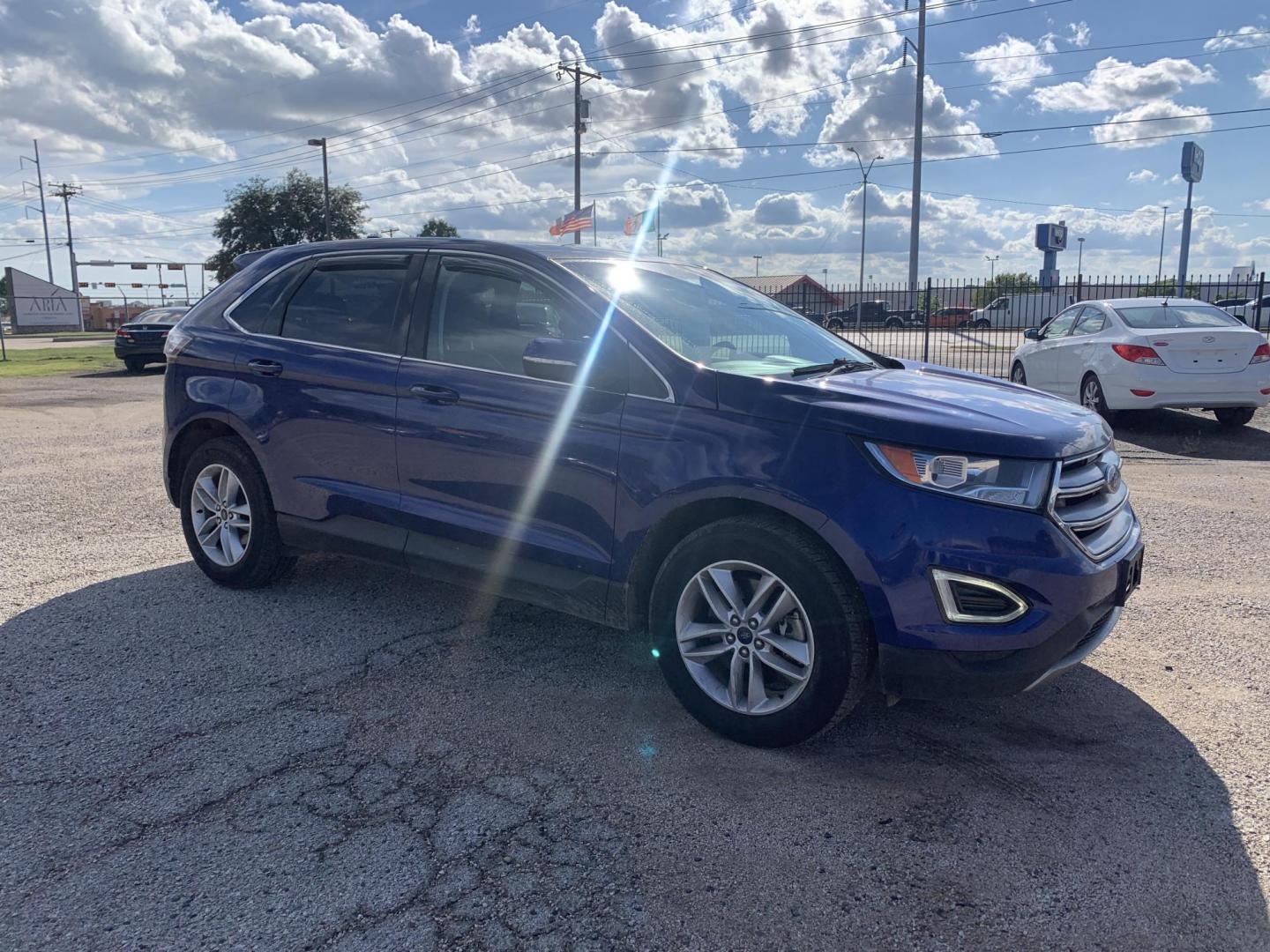 2015 Blue /Black Ford Edge SEL AWD (2FMTK4J97FB) with an 2.0L L4 DOHC 16V engine, Automatic transmission, located at 1830 North Belt Line Road, Irving, TX, 75061, (469) 524-0199, 32.834373, -96.993584 - Photo#6