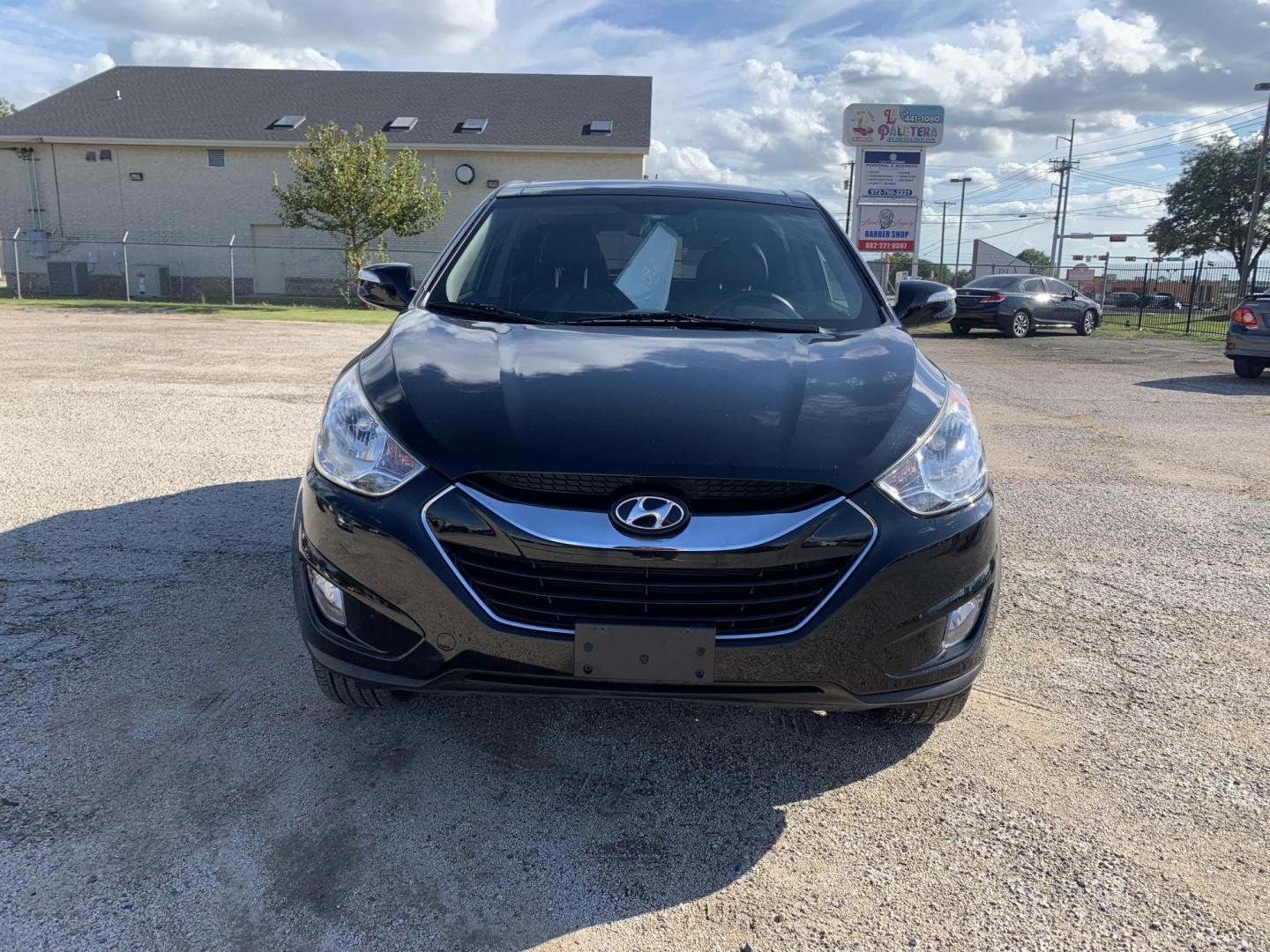 2012 Black /Tan Hyundai Tucson Limited 2WD (KM8JU3AC5CU) with an 2.4L L4 DOHC 16V engine, Automatic transmission, located at 1830 North Belt Line Road, Irving, TX, 75061, (469) 524-0199, 32.834373, -96.993584 - Photo#1