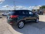 2012 Black /Tan Hyundai Tucson Limited 2WD (KM8JU3AC5CU) with an 2.4L L4 DOHC 16V engine, Automatic transmission, located at 1830 North Belt Line Road, Irving, TX, 75061, (469) 524-0199, 32.834373, -96.993584 - Photo#3