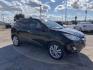 2012 Black /Tan Hyundai Tucson Limited 2WD (KM8JU3AC5CU) with an 2.4L L4 DOHC 16V engine, Automatic transmission, located at 1830 North Belt Line Road, Irving, TX, 75061, (469) 524-0199, 32.834373, -96.993584 - Photo#9