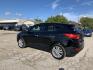 2012 Black /Tan Hyundai Tucson Limited 2WD (KM8JU3AC5CU) with an 2.4L L4 DOHC 16V engine, Automatic transmission, located at 1830 North Belt Line Road, Irving, TX, 75061, (469) 524-0199, 32.834373, -96.993584 - Photo#5
