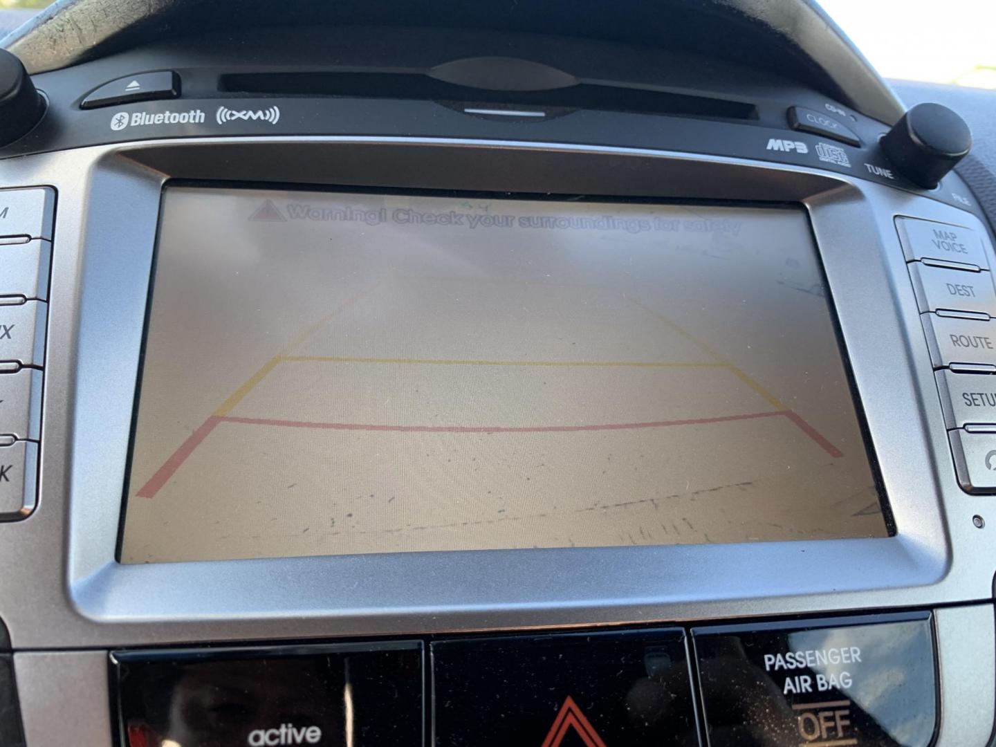 2012 Black /Tan Hyundai Tucson Limited 2WD (KM8JU3AC5CU) with an 2.4L L4 DOHC 16V engine, Automatic transmission, located at 1830 North Belt Line Road, Irving, TX, 75061, (469) 524-0199, 32.834373, -96.993584 - Photo#15