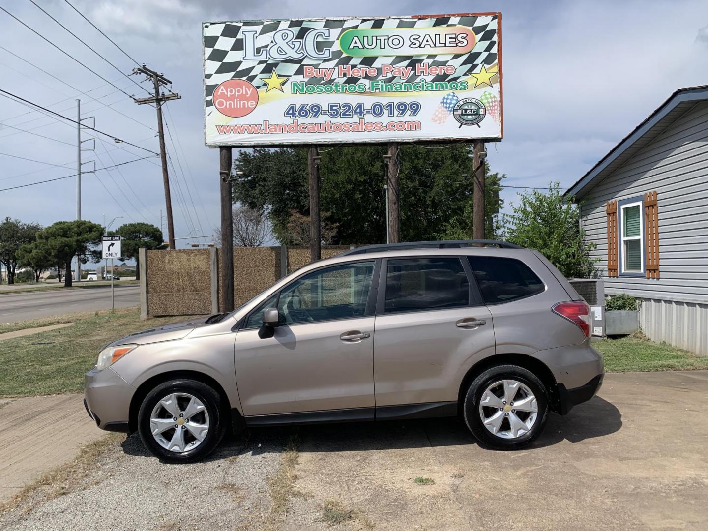 2015 Tan /Black Subaru Forester 2.5i Premium (JF2SJAGC5FH) with an 2.5L H4 SOHC 16V engine, Automatic transmission, located at 1830 North Belt Line Road, Irving, TX, 75061, (469) 524-0199, 32.834373, -96.993584 - Photo#0
