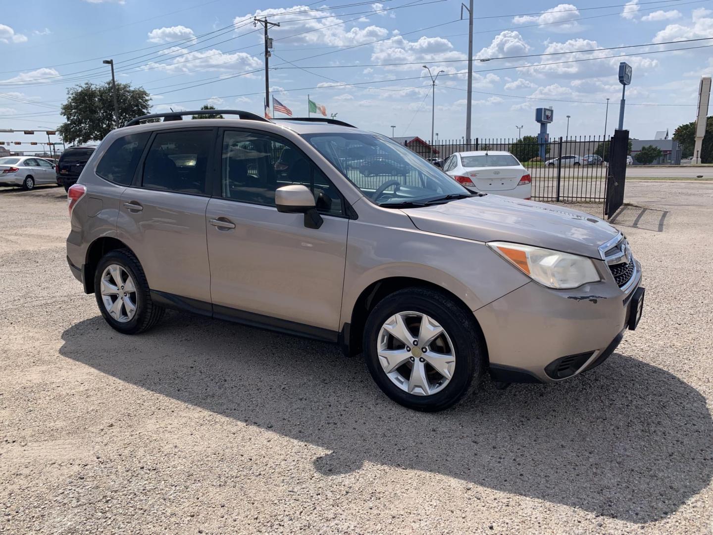 2015 Tan /Black Subaru Forester 2.5i Premium (JF2SJAGC5FH) with an 2.5L H4 SOHC 16V engine, Automatic transmission, located at 1830 North Belt Line Road, Irving, TX, 75061, (469) 524-0199, 32.834373, -96.993584 - Photo#4