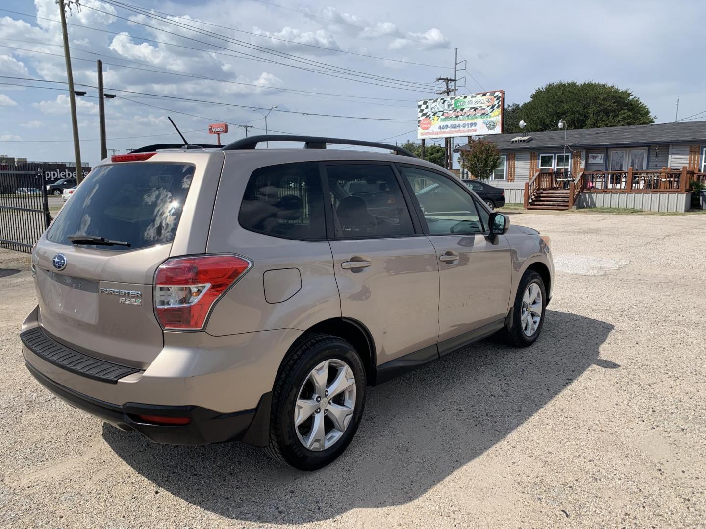 2015 Tan /Black Subaru Forester 2.5i Premium (JF2SJAGC5FH) with an 2.5L H4 SOHC 16V engine, Automatic transmission, located at 1830 North Belt Line Road, Irving, TX, 75061, (469) 524-0199, 32.834373, -96.993584 - Photo#5