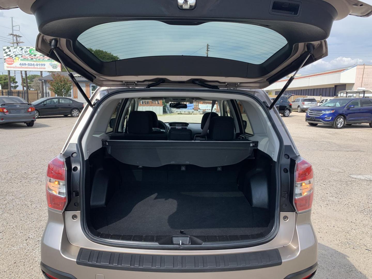 2015 Tan /Black Subaru Forester 2.5i Premium (JF2SJAGC5FH) with an 2.5L H4 SOHC 16V engine, Automatic transmission, located at 1830 North Belt Line Road, Irving, TX, 75061, (469) 524-0199, 32.834373, -96.993584 - Photo#7