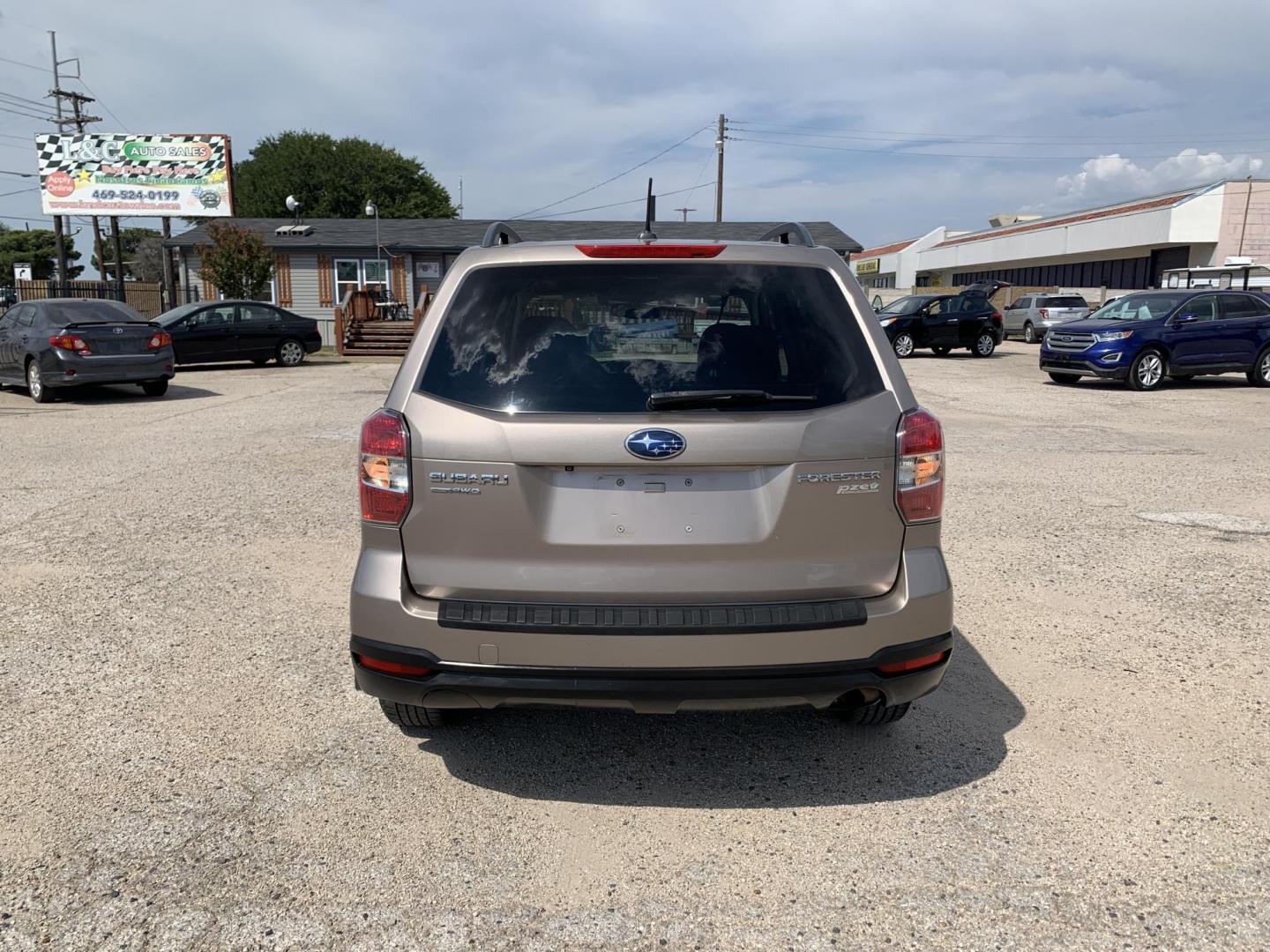 2015 Tan /Black Subaru Forester 2.5i Premium (JF2SJAGC5FH) with an 2.5L H4 SOHC 16V engine, Automatic transmission, located at 1830 North Belt Line Road, Irving, TX, 75061, (469) 524-0199, 32.834373, -96.993584 - Photo#6