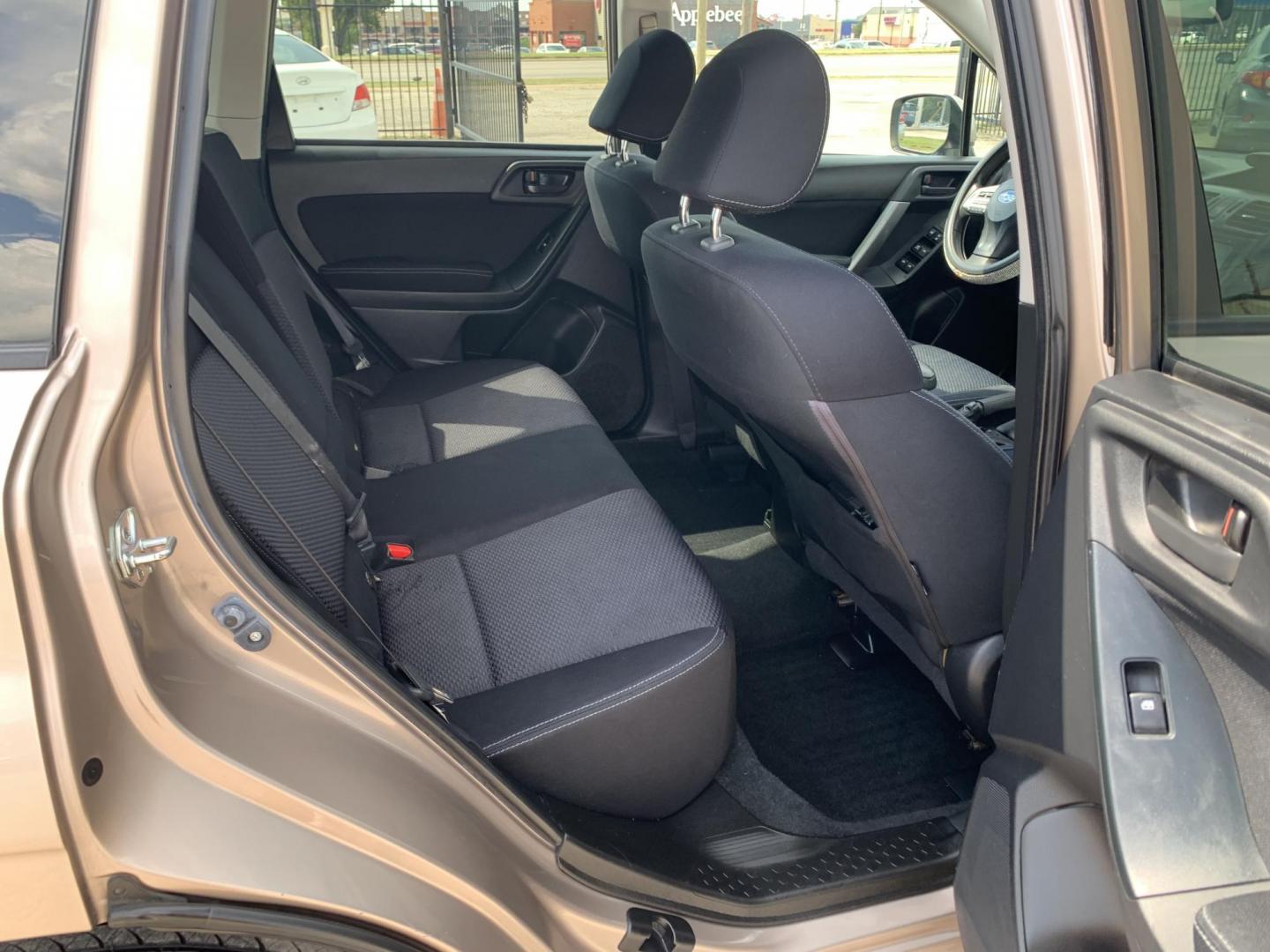 2015 Tan /Black Subaru Forester 2.5i Premium (JF2SJAGC5FH) with an 2.5L H4 SOHC 16V engine, Automatic transmission, located at 1830 North Belt Line Road, Irving, TX, 75061, (469) 524-0199, 32.834373, -96.993584 - Photo#10