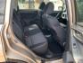 2015 Tan /Black Subaru Forester 2.5i Premium (JF2SJAGC5FH) with an 2.5L H4 SOHC 16V engine, Automatic transmission, located at 1830 North Belt Line Road, Irving, TX, 75061, (469) 524-0199, 32.834373, -96.993584 - Photo#10