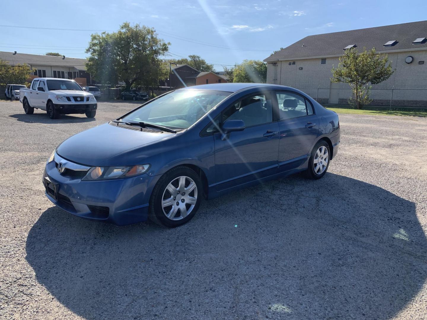 2010 Blue /gray Honda Civic LX Sedan AT (19XFA1F56AE) with an 1.8L L4 SOHC 16V engine, Automatic transmission, located at 1830 North Belt Line Road, Irving, TX, 75061, (469) 524-0199, 32.834373, -96.993584 - Photo#2