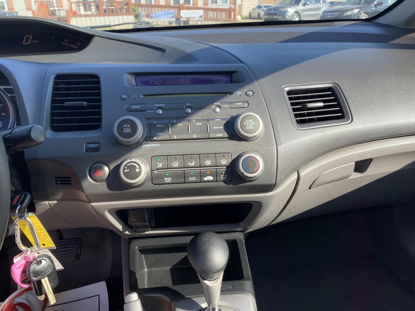 2010 Blue /gray Honda Civic LX Sedan AT (19XFA1F56AE) with an 1.8L L4 SOHC 16V engine, Automatic transmission, located at 1830 North Belt Line Road, Irving, TX, 75061, (469) 524-0199, 32.834373, -96.993584 - Photo#11