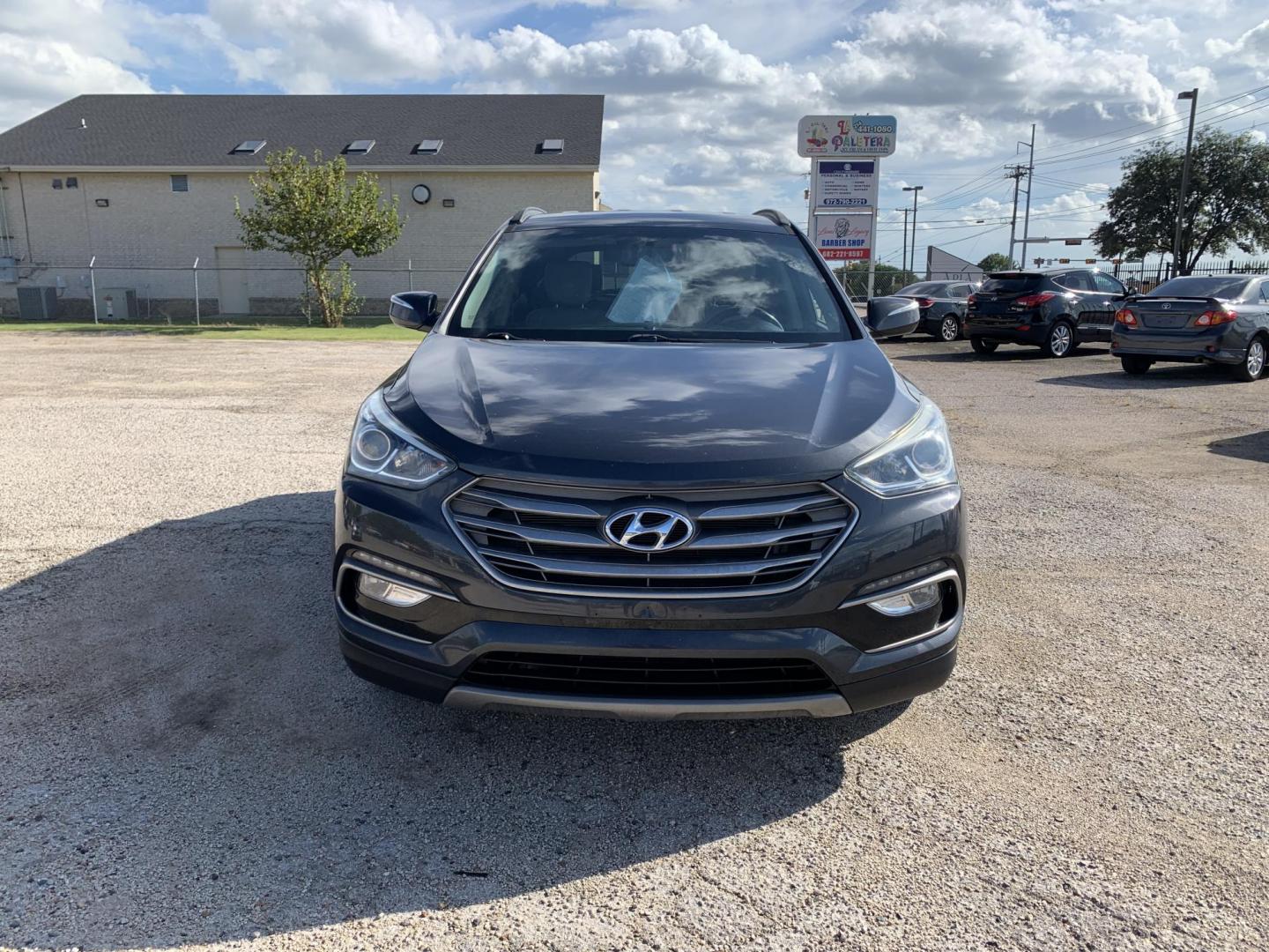 2017 Gray /Black Hyundai Santa Fe Sport 2.4 FWD (5XYZU3LB8HG) with an 2.4L L4 DOHC 16V engine, AUTOMATIC transmission, located at 1830 North Belt Line Road, Irving, TX, 75061, (469) 524-0199, 32.834373, -96.993584 - Photo#1