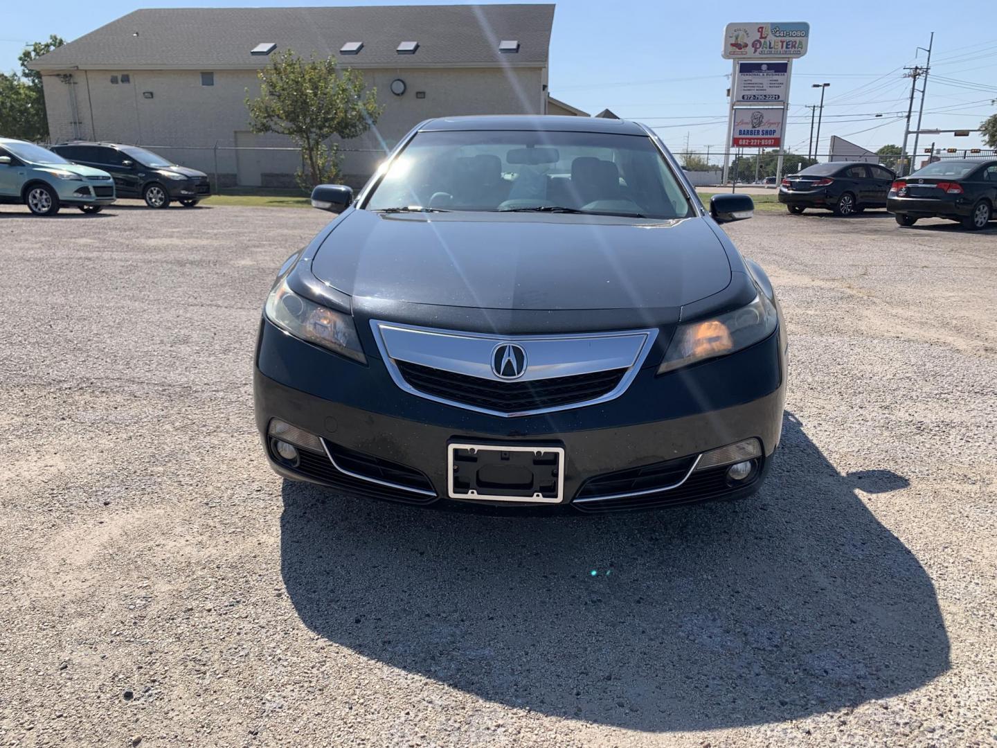 2014 Black /Tan Acura TL (19UUA8F21EA) with an 3.5L V6 SOHC 24V engine, AUTOMATIC transmission, located at 1830 North Belt Line Road, Irving, TX, 75061, (469) 524-0199, 32.834373, -96.993584 - Photo#1