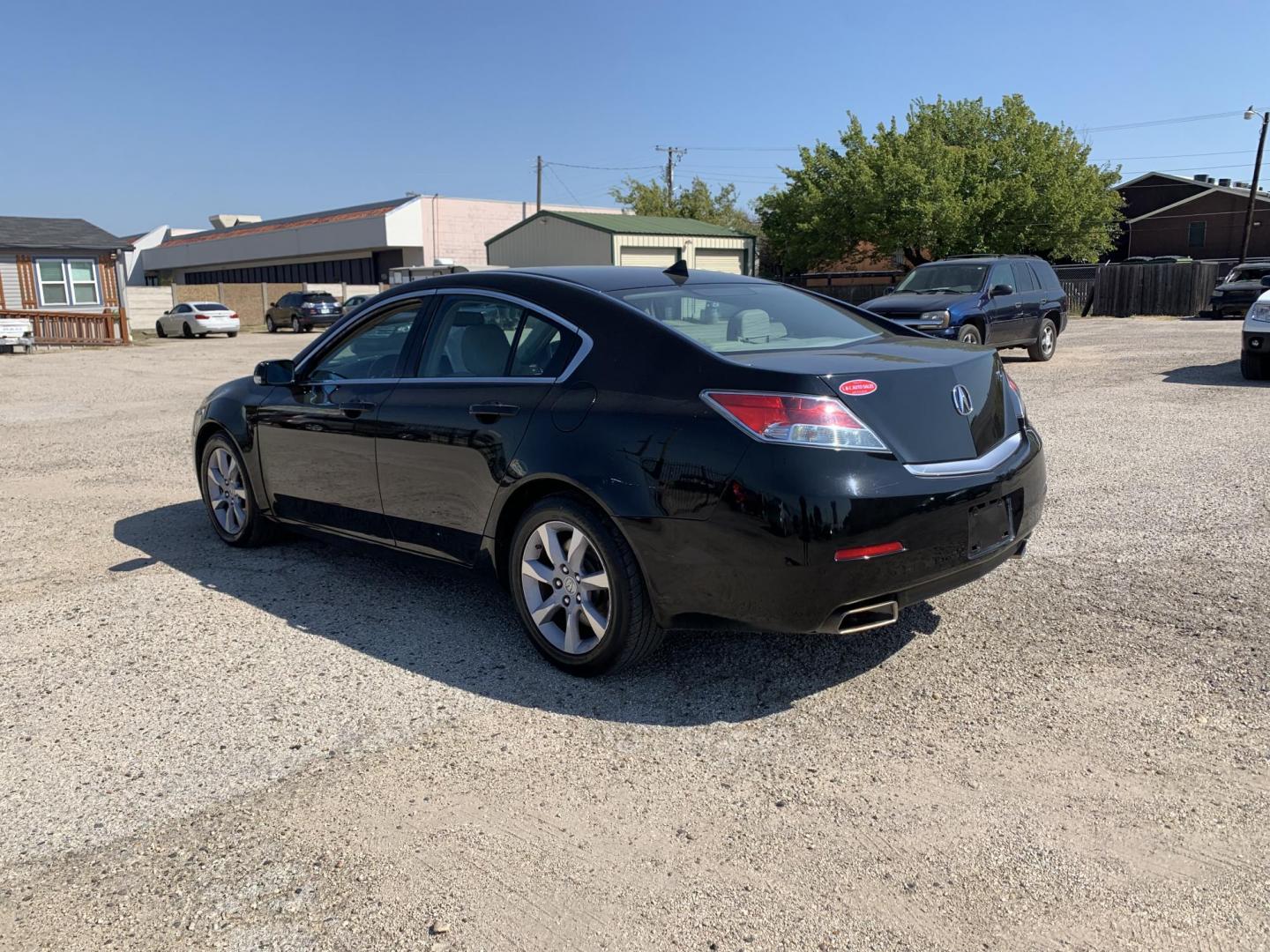 2014 Black /Tan Acura TL (19UUA8F21EA) with an 3.5L V6 SOHC 24V engine, AUTOMATIC transmission, located at 1830 North Belt Line Road, Irving, TX, 75061, (469) 524-0199, 32.834373, -96.993584 - Photo#5