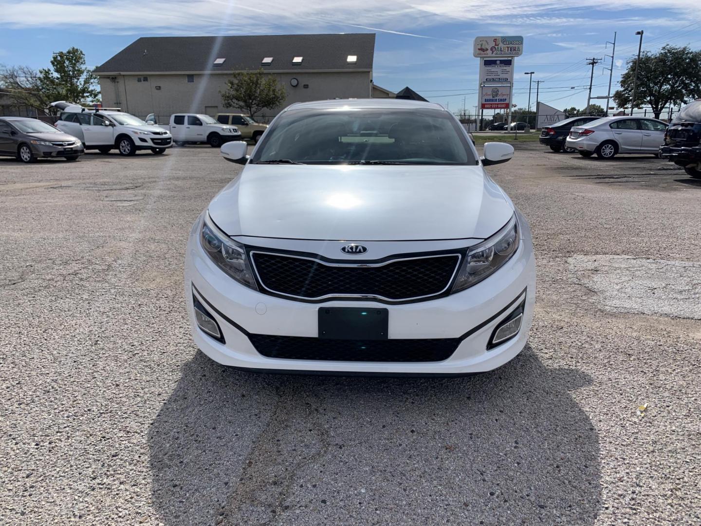 2015 White /Black Kia Optima LX (KNAGM4A7XF5) with an 2.4L L4 DOHC 16V engine, Automatic transmission, located at 1830 North Belt Line Road, Irving, TX, 75061, (469) 524-0199, 32.834373, -96.993584 - Photo#1