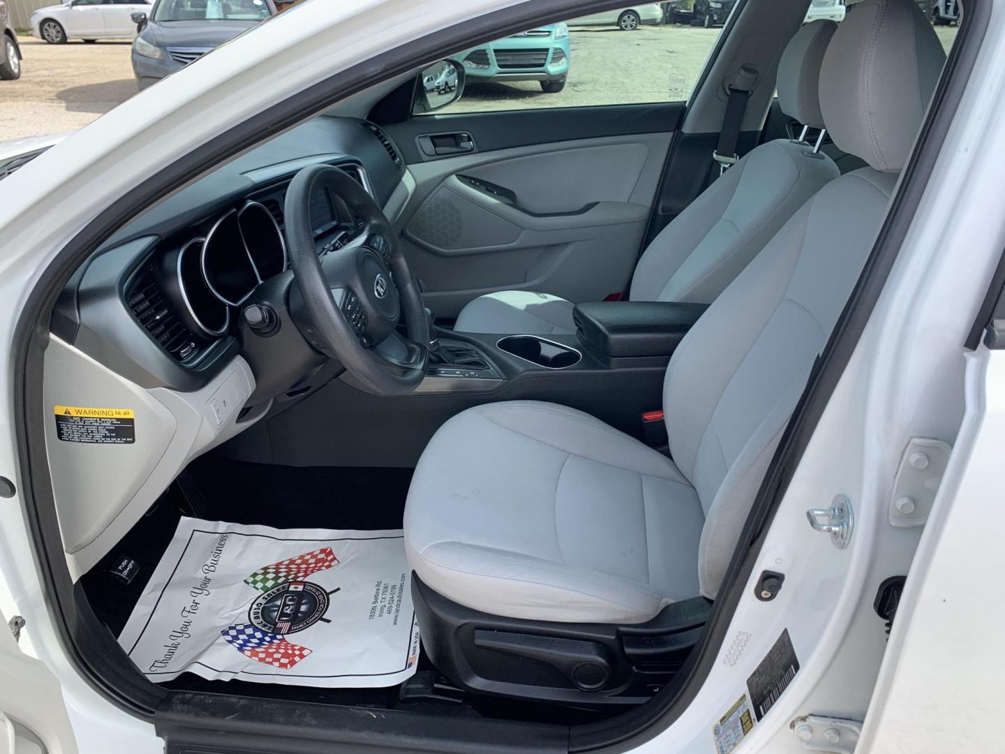 2015 White /Black Kia Optima LX (KNAGM4A7XF5) with an 2.4L L4 DOHC 16V engine, Automatic transmission, located at 1830 North Belt Line Road, Irving, TX, 75061, (469) 524-0199, 32.834373, -96.993584 - Photo#7