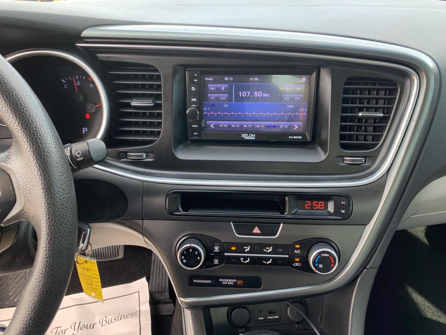 2015 White /Black Kia Optima LX (KNAGM4A7XF5) with an 2.4L L4 DOHC 16V engine, Automatic transmission, located at 1830 North Belt Line Road, Irving, TX, 75061, (469) 524-0199, 32.834373, -96.993584 - Photo#11