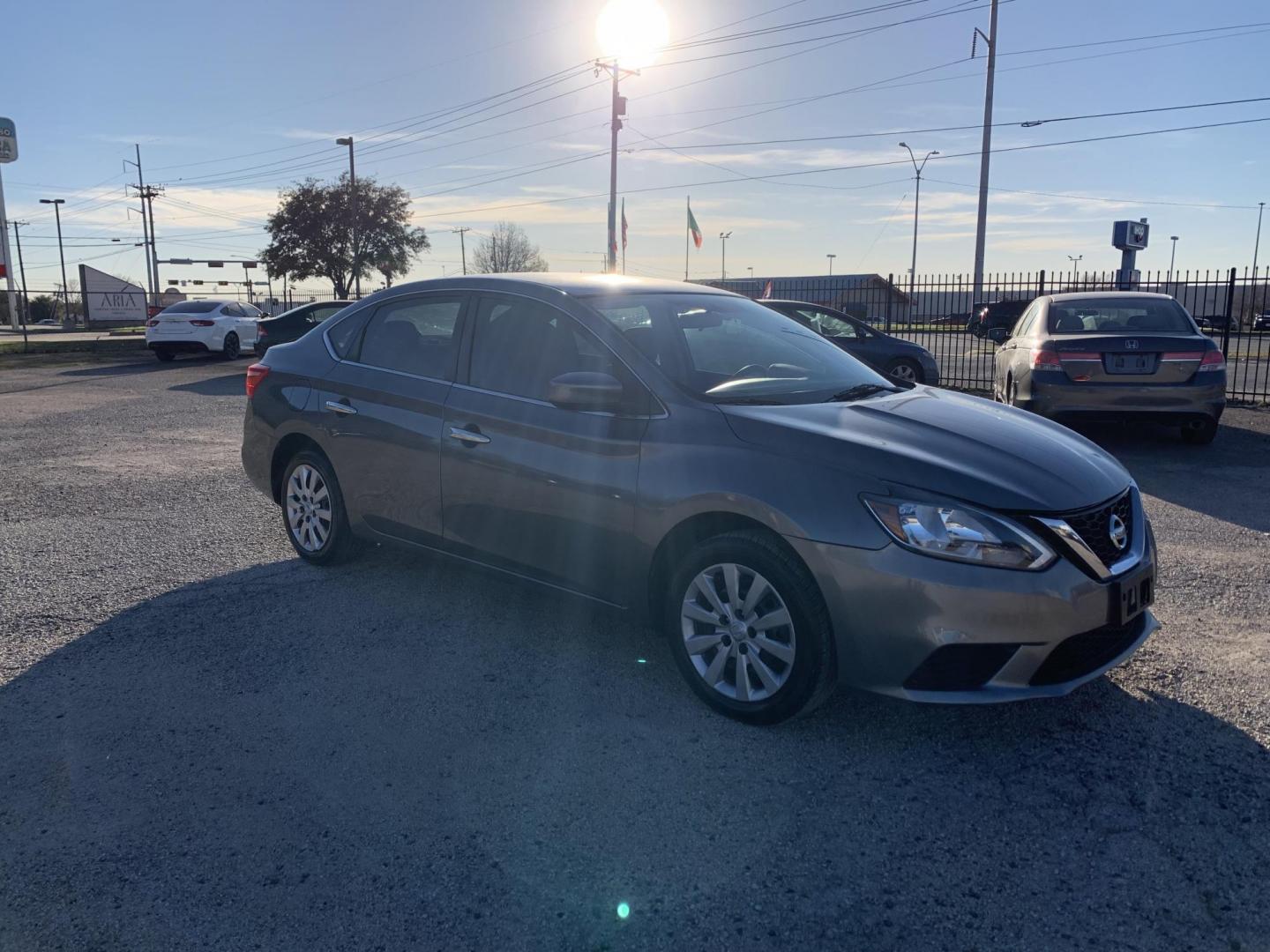 2017 Gray /Black Nissan Sentra S (3N1AB7AP5HY) with an 1.8L L4 SFI DOHC 16V engine, AUTOMATIC transmission, located at 1830 North Belt Line Road, Irving, TX, 75061, (469) 524-0199, 32.834373, -96.993584 - Photo#6