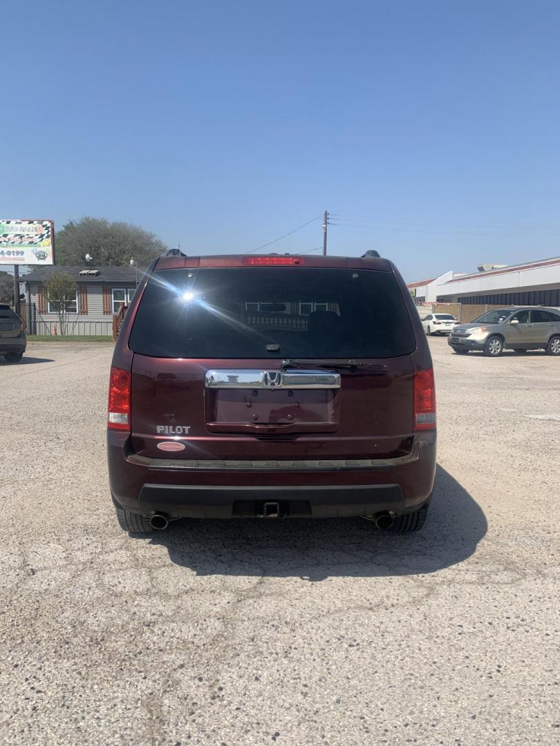 2010 Maroon /Tan Honda Pilot EX-L 2WD AT (5FNYF3H51AB) with an 3.5L V6 SOHC 24V engine, Automatic transmission, located at 1830 North Belt Line Road, Irving, TX, 75061, (469) 524-0199, 32.834373, -96.993584 - Photo#4