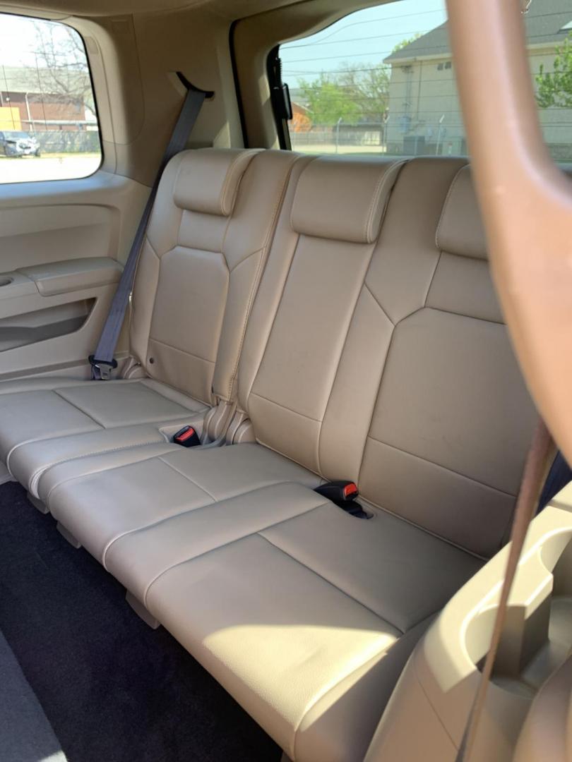 2010 Maroon /Tan Honda Pilot EX-L 2WD AT (5FNYF3H51AB) with an 3.5L V6 SOHC 24V engine, Automatic transmission, located at 1830 North Belt Line Road, Irving, TX, 75061, (469) 524-0199, 32.834373, -96.993584 - Photo#9