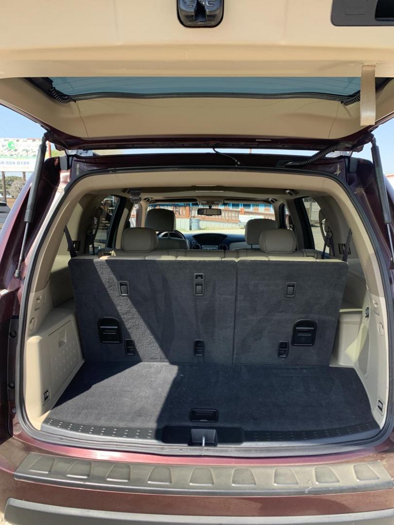 2010 Maroon /Tan Honda Pilot EX-L 2WD AT (5FNYF3H51AB) with an 3.5L V6 SOHC 24V engine, Automatic transmission, located at 1830 North Belt Line Road, Irving, TX, 75061, (469) 524-0199, 32.834373, -96.993584 - Photo#10