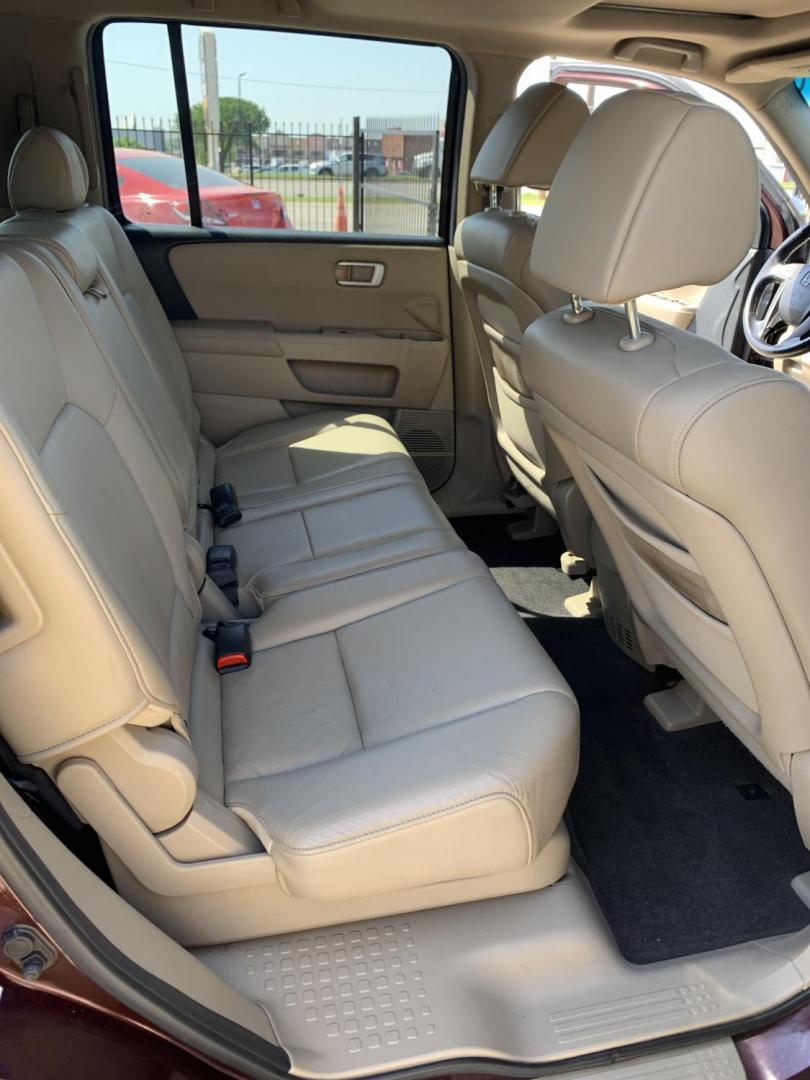 2010 Maroon /Tan Honda Pilot EX-L 2WD AT (5FNYF3H51AB) with an 3.5L V6 SOHC 24V engine, Automatic transmission, located at 1830 North Belt Line Road, Irving, TX, 75061, (469) 524-0199, 32.834373, -96.993584 - Photo#12
