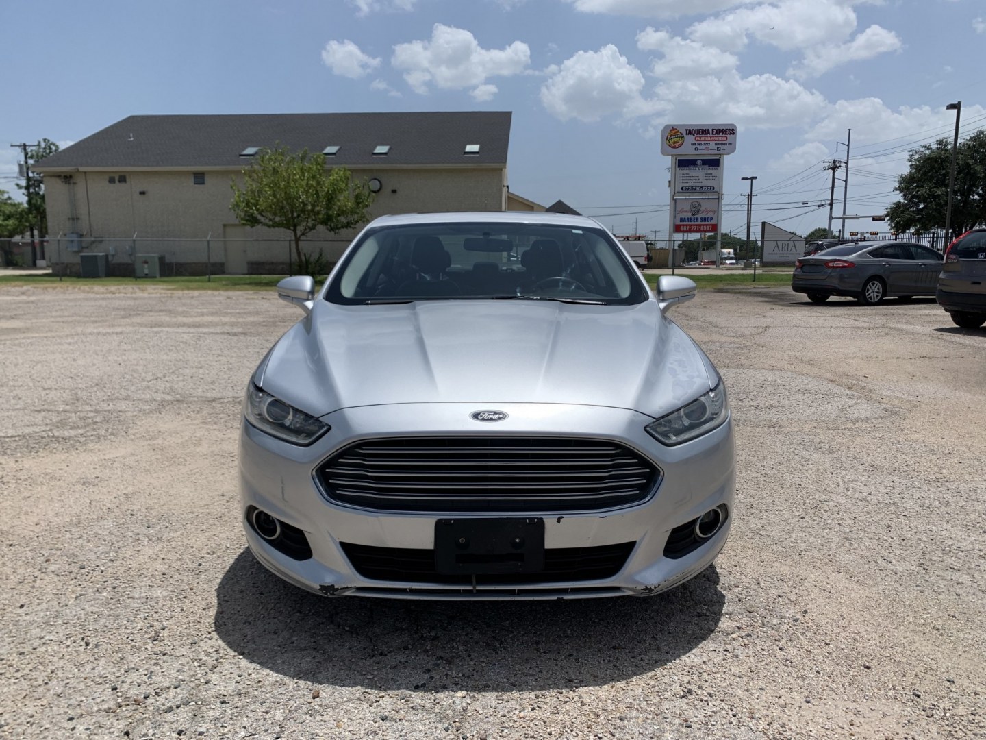 2016 Silver /Black Ford Fusion SE (3FA6P0HD5GR) with an 1.5L L4 DOHC 16V engine, Automatic transmission, located at 1830 North Belt Line Road, Irving, TX, 75061, (469) 524-0199, 32.834373, -96.993584- Photo#1