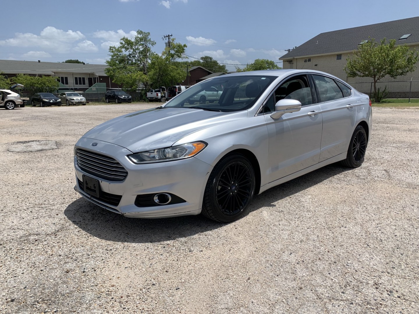 2016 Silver /Black Ford Fusion SE (3FA6P0HD5GR) with an 1.5L L4 DOHC 16V engine, Automatic transmission, located at 1830 North Belt Line Road, Irving, TX, 75061, (469) 524-0199, 32.834373, -96.993584- Photo#2